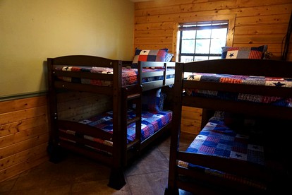 Fantastic Log Cabin Rental for a Fun-Filled Family Vacation in Texas - Nacogdoches, Texas - glamping.directory