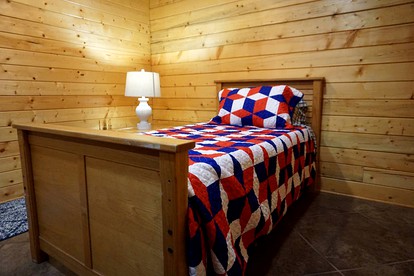 Fantastic Log Cabin Rental for a Fun-Filled Family Vacation in Texas - Nacogdoches, Texas - glamping.directory