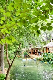 Cibolo Waterside Delight: Tented Cabin Glamping with Comfortable Shared Spaces - Cibolo, Texas - glamping.directory