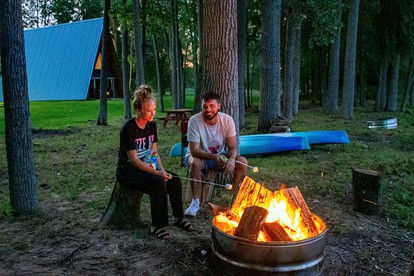 Lofted A-Frame Cabin with Direct Lake Access and Equipped Deck in Michigan - glamping.directory