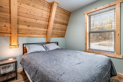 Lofted A-Frame Cabin with Direct Lake Access and Equipped Deck in Michigan - Au Gres, Michigan - glamping.directory