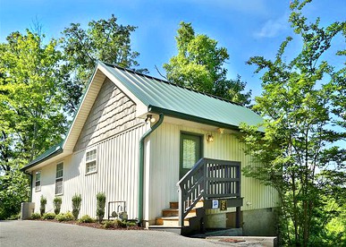 Rustic Cabin Getaway with a Fireplace in Pigeon Forge, Tennessee - glamping.directory