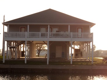 Pet-Friendly Vacation Rental with a Boat Slip on a Canal in Crystal Beach, Texas - glamping.directory