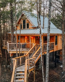 Woodland Wonder: Experience Luxury in a Treehouse in Norway, ME - Norway, Maine - glamping.directory
