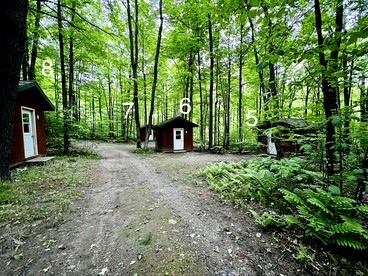 Porched Cabin for a Memorable Family Glamping Getaway near Wolf River in Wisconsin - White Lake, Wisconsin - glamping.directory