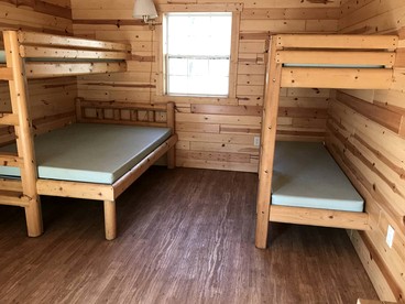 Porched Cabin for a Memorable Family Glamping Getaway near Wolf River in Wisconsin - White Lake, Wisconsin - glamping.directory