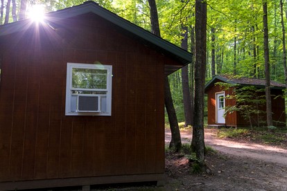Porched Cabin for a Memorable Family Glamping Getaway near Wolf River in Wisconsin - White Lake, Wisconsin - glamping.directory