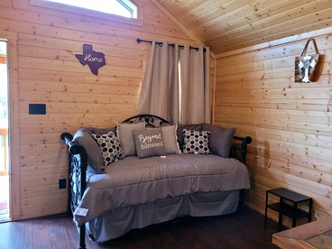 Lovely Nature Getaways near Austin, Texas, in this Cute Cabin Rental in Pipe Creek - Pipe Creek, Texas - glamping.directory