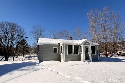 Serene Woodland Escape with Lake Access & Cozy Fire Pit in Greenville, Maine - glamping.directory