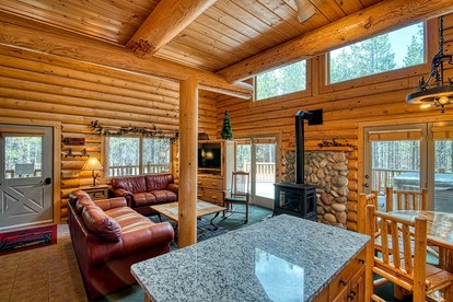 Luxurious Forest Cabin with Hot Tub and Game Room Near Outdoor Adventures in Island Park, Idaho - Idaho City, Idaho - glamping.directory