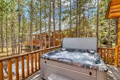 Luxurious Forest Cabin with Hot Tub and Game Room Near Outdoor Adventures in Island Park, Idaho - Idaho City, Idaho - glamping.directory