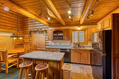 Luxurious Forest Cabin with Hot Tub and Game Room Near Outdoor Adventures in Island Park, Idaho - Idaho City, Idaho - glamping.directory