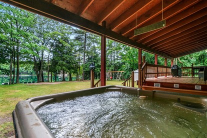 Pet Friendly Lakefront Cottage with Hot-tub in Johannesburg, Michigan - Johannesburg, Michigan - glamping.directory