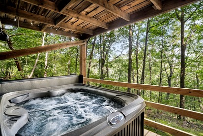 Modern Mountainside Cabin with Hot Tub, Fire Pit, Large Deck and Covered Porch - Perfect for Your Family Getaway in Hedgesville, WV - Hedgesville, West Virginia - glamping.directory