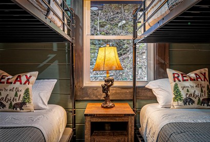 Smoky Mountain Cabin Retreat with Hot Tub, Game Room, Mini Golf & Creek Views in Pigeon Forge, Tennessee - Pigeon Forge, Tennessee - glamping.directory