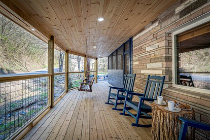 Smoky Mountain Cabin Retreat with Hot Tub, Game Room, Mini Golf & Creek Views in Pigeon Forge, Tennessee - Pigeon Forge, Tennessee - glamping.directory
