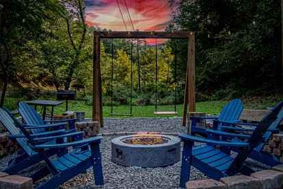 Smoky Mountain Cabin Retreat with Hot Tub, Game Room, Mini Golf & Creek Views in Pigeon Forge, Tennessee - Pigeon Forge, Tennessee - glamping.directory