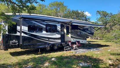 One of a Kind Converted School Bus Offers Scenic, Texan Tranquility in Purdon Groves - Boerne, Texas - glamping.directory