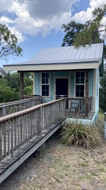 Colorful Waterfront Cabin Rentals on the Braden River near Sarasota, Florida - Bradenton, Florida - glamping.directory