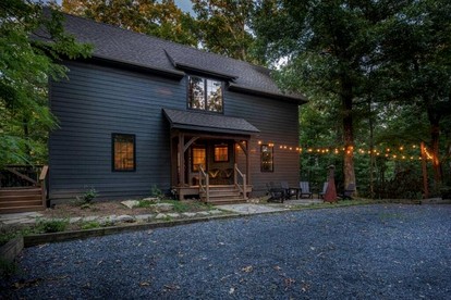 Wintergreen Getaways in this Charming Cabin Rental with Hot Tub and Fire Pit - glamping.directory