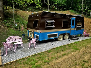 Cute Off-Grid Camper on an Exotic-Animal Farm for a Unique Getaway near Charleston, West Virginia - glamping.directory