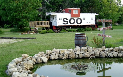 Authentic Caboose Rental near the Little La Crosse River in Sparta, Wisconsin - glamping.directory