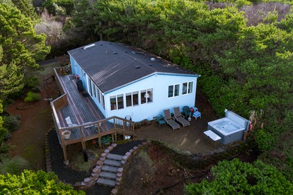 Secluded Beach Cottage with Private Hot Tub and Ocean Views in Seal Rock, Oregon - glamping.directory
