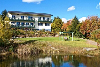 Cozy Suite Rental in a Bed and Breakfast with Fireplace and Magnificent Mountain Views near New Hampshire's Newfound Lake - Hebron, New Hampshire - glamping.directory