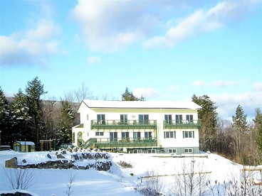 Cozy Suite Rental in a Bed and Breakfast with Fireplace and Magnificent Mountain Views near New Hampshire's Newfound Lake - glamping.directory