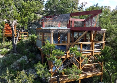 Epic Treehouse Escape with Multi-Level Deck & Hanging Bed in Cottonwood, Texas - Cottonwood Shores, Texas - glamping.directory