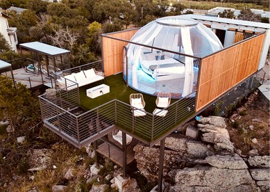 Epic Treehouse Escape with Multi-Level Deck & Hanging Bed in Cottonwood, Texas - Cottonwood Shores, Texas - glamping.directory
