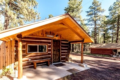 Cozy Historic Log Cabin with Fire Pit and Private Backyard on the Edge of the Kaibab National Forest in Parks, Arizona - glamping.directory