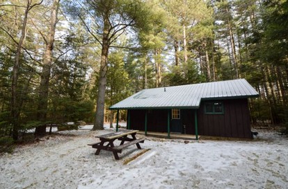 Idyllic Waterfront Cabin Retreat Situated on Heart Lake in New York - glamping.directory