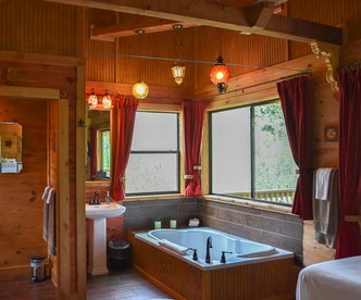 Unique Elevated Cabin Rental with Whirlpool Tub near Somerville Lake, Texas - Brenham, Texas - glamping.directory