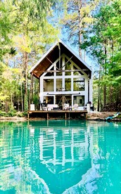 Escape to Elegance: Waterfront Cabin in a Texas Forest – Ideal Glamping Getaway - glamping.directory