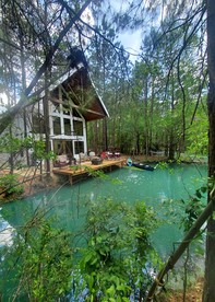 Escape to Elegance: Waterfront Cabin in a Texas Forest – Ideal Glamping Getaway - Grimes County, Texas - glamping.directory