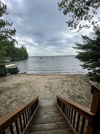 Rustic Pet-Friendly Cabin with Fire Pit on the Beach of Sebago Lake, Maine - Sebago, Maine - glamping.directory