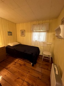 Rustic Pet-Friendly Cabin with Fire Pit on the Beach of Sebago Lake, Maine - Sebago, Maine - glamping.directory