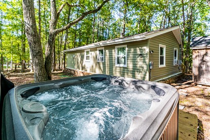 Charming Dog-Friendly Cabin with Hot Tub and Fire Pit - Pond Access Makes This the Perfect Cabin for Your Fishing Getaway in Berkeley Springs, WV - glamping.directory