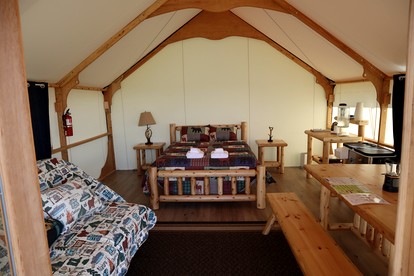 Cozy and Warm Safari Tent Rental in Seward, Alaska with Beautiful Views - The Perfect Romantic Mountain Getaway - glamping.directory