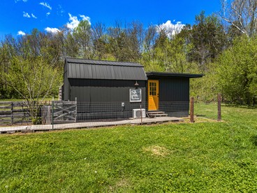 Peaceful Cabin Retreat with Spa Features & Unique Farm Vibes in Newport, Tennessee - glamping.directory