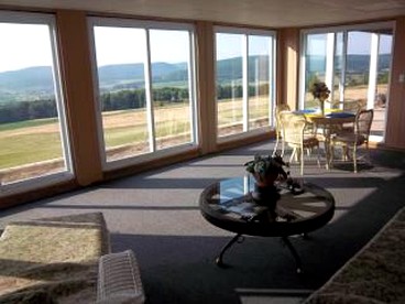 Charming Vacation Cottage with Breathtaking Lake Views near Ithaca, New York - glamping.directory