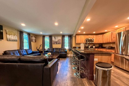 Secluded Group Retreat with Hot Tub, Riverfront & Huge Yard in Conway, New Hampshire - Conway, New Hampshire - glamping.directory