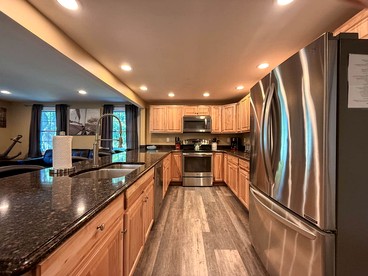 Secluded Group Retreat with Hot Tub, Riverfront & Huge Yard in Conway, New Hampshire - Conway, New Hampshire - glamping.directory