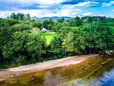 Secluded Group Retreat with Hot Tub, Riverfront & Huge Yard in Conway, New Hampshire - Conway, New Hampshire - glamping.directory