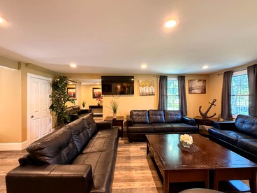 Secluded Group Retreat with Hot Tub, Riverfront & Huge Yard in Conway, New Hampshire - Conway, New Hampshire - glamping.directory