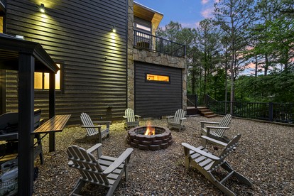 Modern Two-Story Cabin with Hot Tub, Game Loft & Fire Pit in Southeast Oklahoma - Broken Bow, Oklahoma - glamping.directory