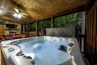 Modern Two-Story Cabin with Hot Tub, Game Loft & Fire Pit in Southeast Oklahoma - Broken Bow, Oklahoma - glamping.directory