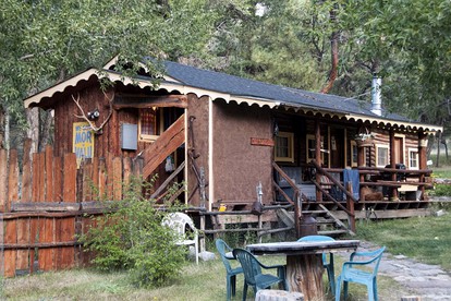 Rustic Log Cabin Set Within Mountains in Colorado - glamping.directory