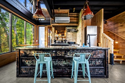 Stunning Luxury Cabin with Unique Furnishings, Indoor Pool, and Game Room in Gatlinburg, Tennessee - Gatlinburg, Tennessee - glamping.directory